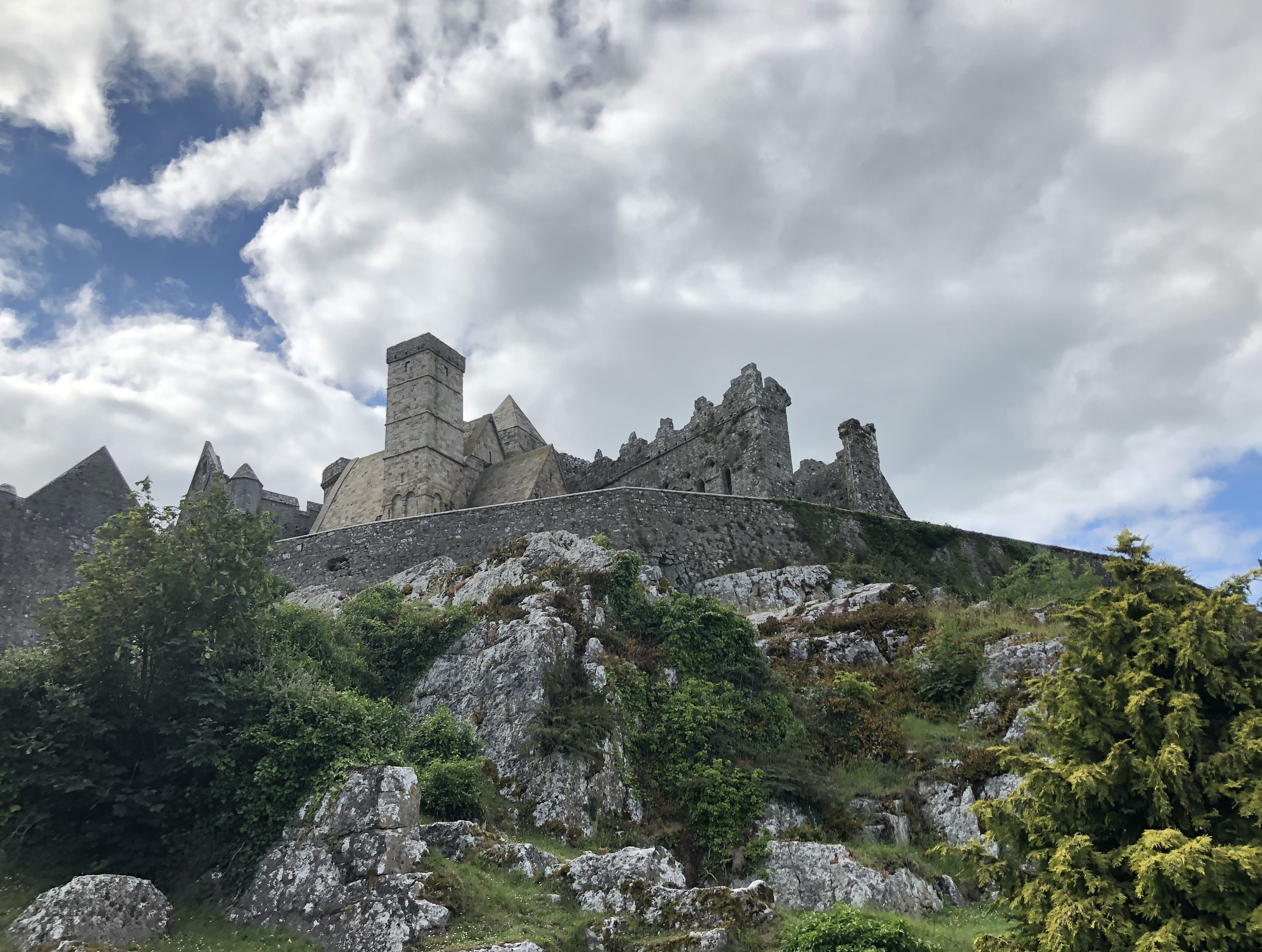 Panoramic view of the Rock of Cashel rising above the Irish countryside