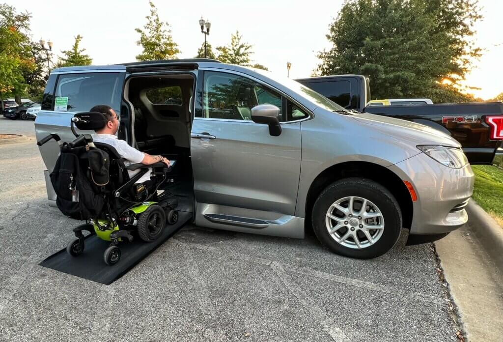 Cory Lee in his wheelchair in front of Fassler Hall in Little Rock