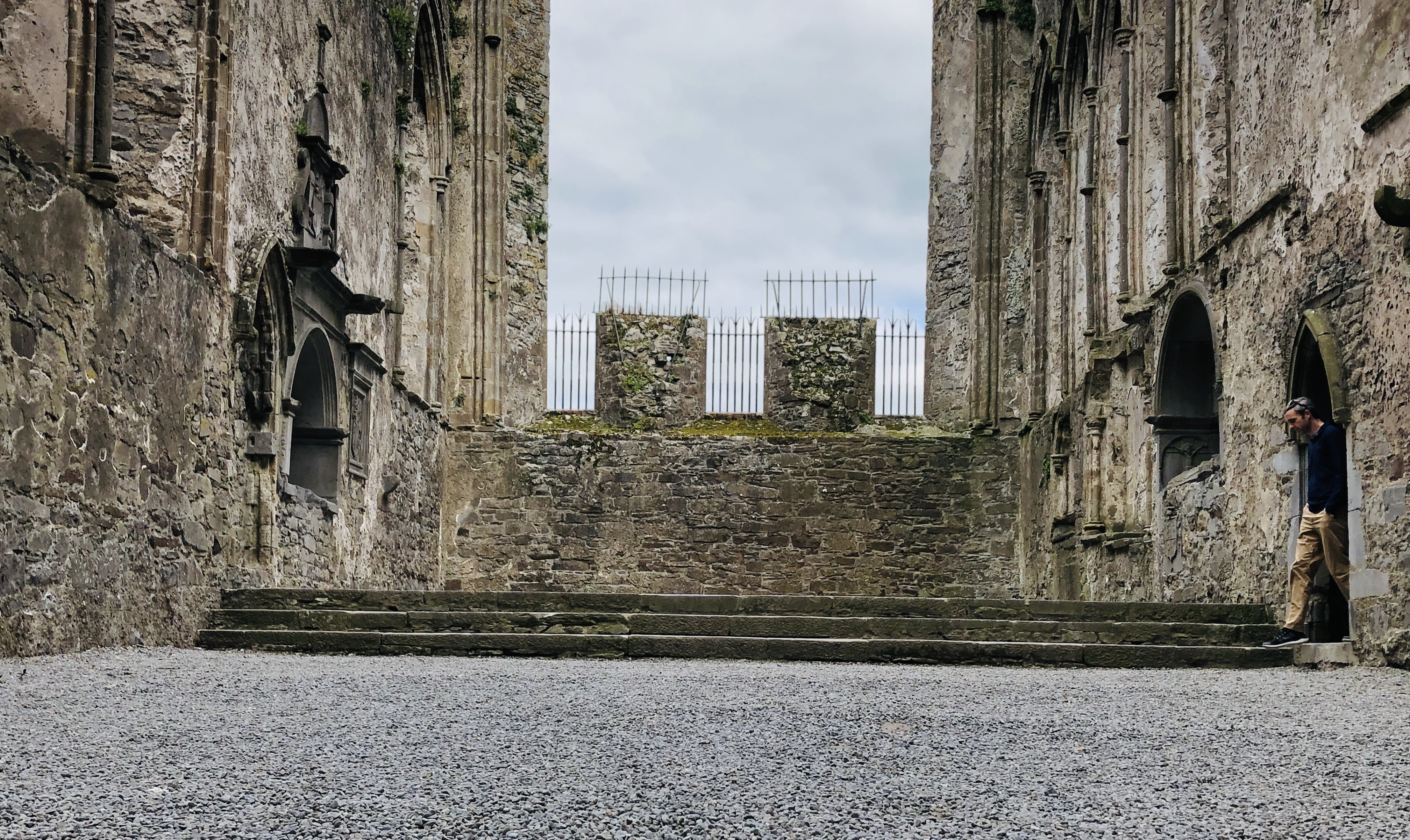 Close-up of the textured stonework of the cathedral ruins