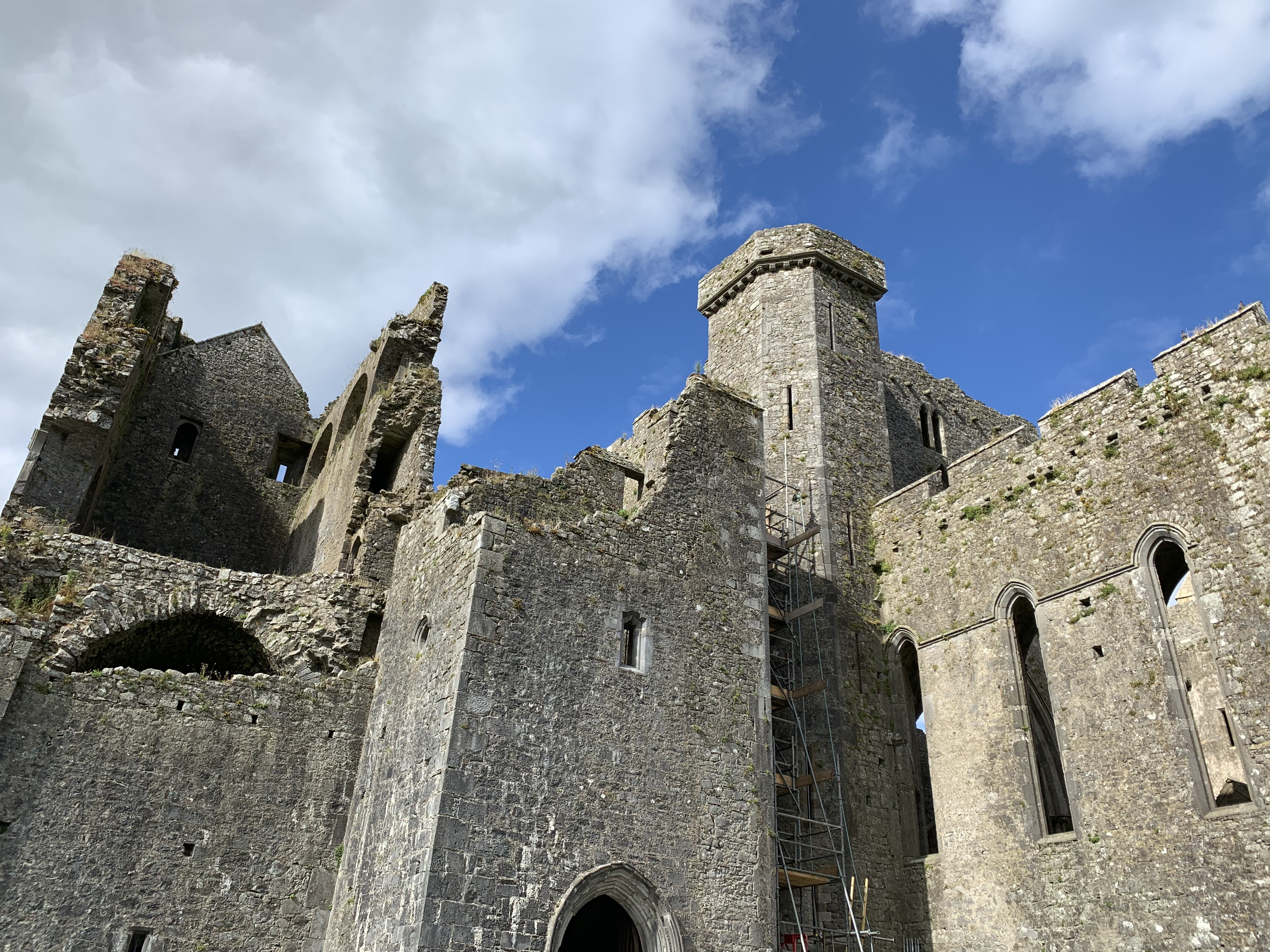 Close-up of Cormac's Chapel exterior showing bird nests in beam holes