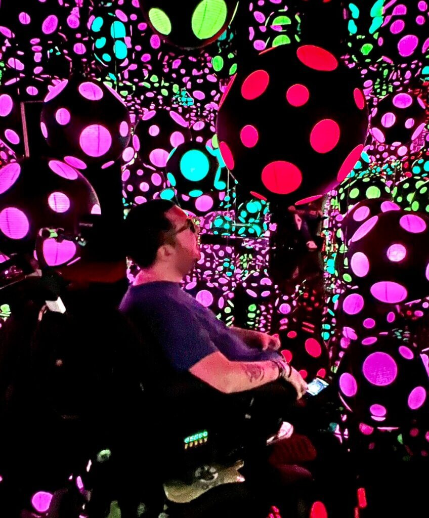 Cory Lee inside the Infinity Mirrored Room at Crystal Bridges