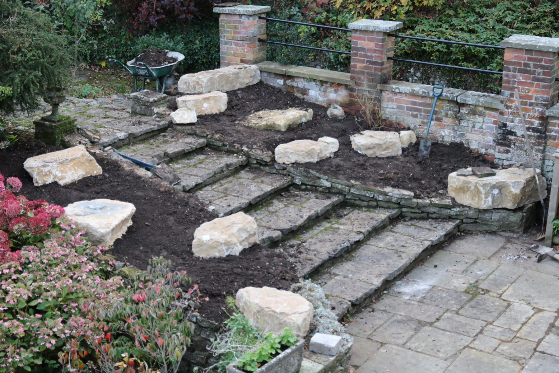 Keystone rocks in place, forming the foundation