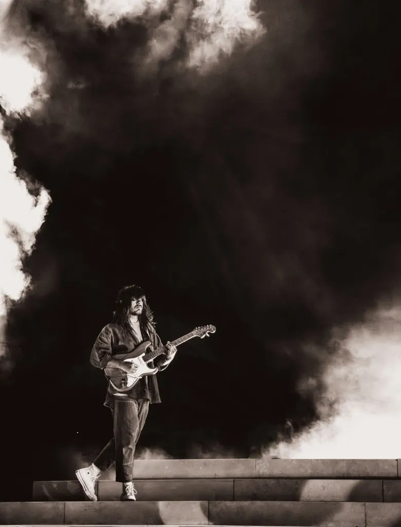 Khruangbin's signature minimalist stage design at Red Rocks, focusing attention on the music and performance.