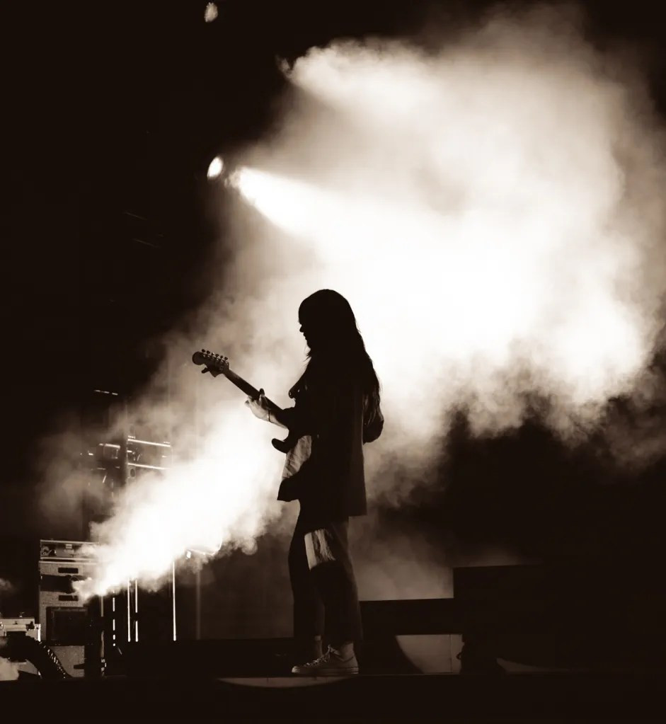 Khruangbin's drummer in a powerful performance moment at their Red Rocks Amphitheatre concert.