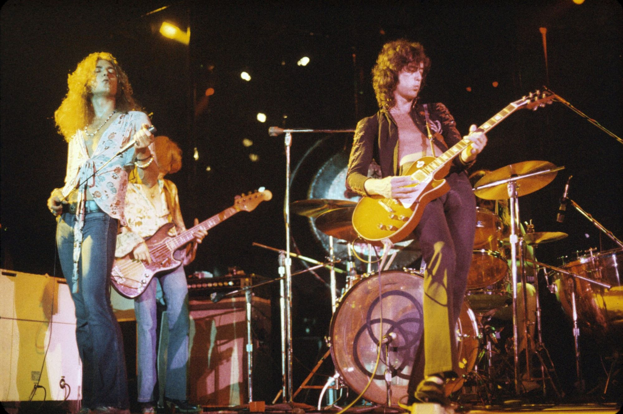 Led Zeppelin, featuring Jimmy Page, Robert Plant, John Bonham, and John Paul Jones, a band widely regarded as one of the greatest rock bands in music history.