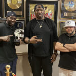 Kool Rock-Ski accepting the induction to the Long Island Music and Entertainment Hall of Fame for The Fat Boys from Erick Sermon, with DJ Johnny Juice on stage