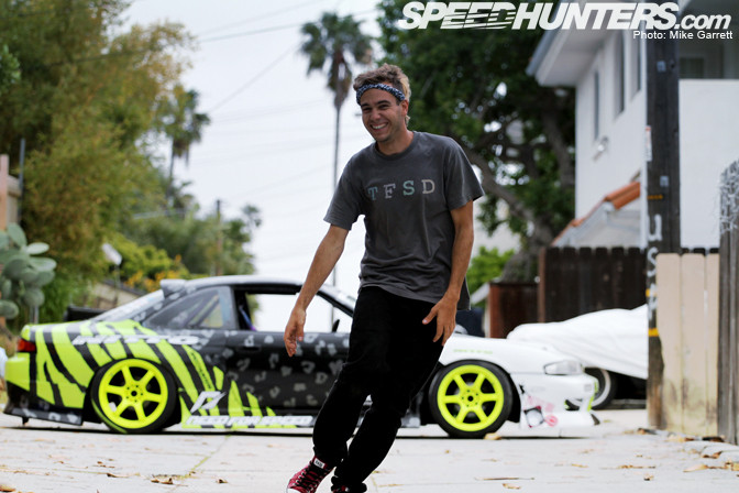 Matt Field leaning against his Nissan S14 drift car after testing