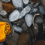 bag and rocks on beach