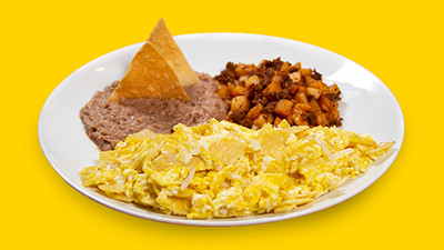 Delicious migas with eggs breakfast plate at Taco Palenque Round Rock, featuring crunchy tortillas scrambled with eggs.