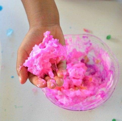 Mixing glue and salt with hands