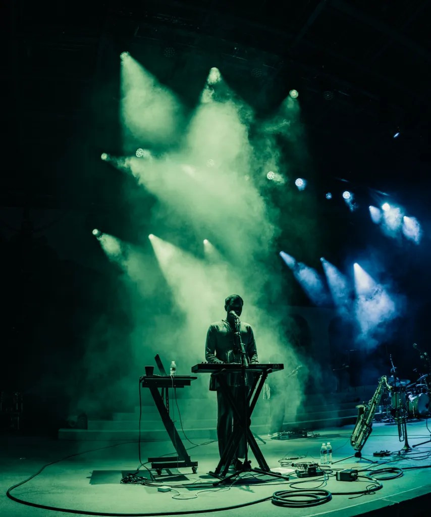 Peter Cat Recording Co.'s Suryakant Sawhney engaging with the Red Rocks audience during their opening set.