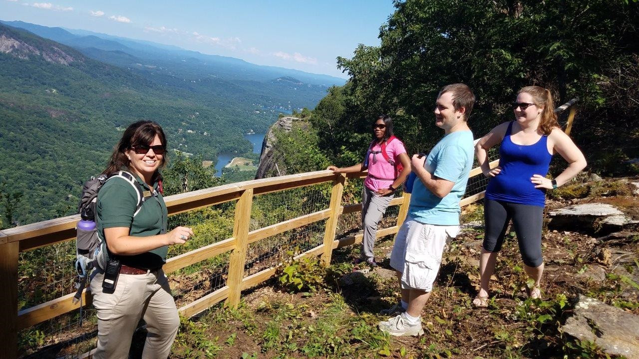 Scenic overlook at Chimney Rock State Park with fall foliage and hiking trails