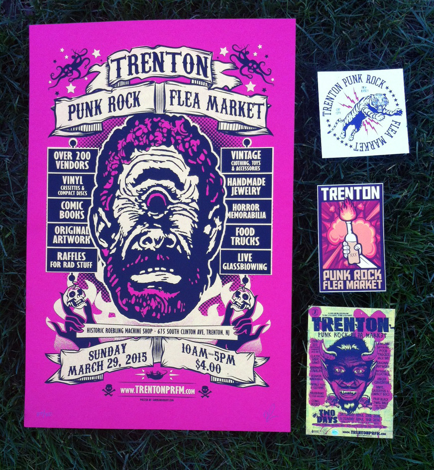 A sign and stickers promoting the Punk Rock Flea Market, highlighting its self-aware marketing.