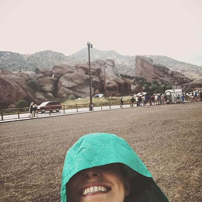 A cloudy sky over Red Rocks Amphitheatre, indicating potential rain