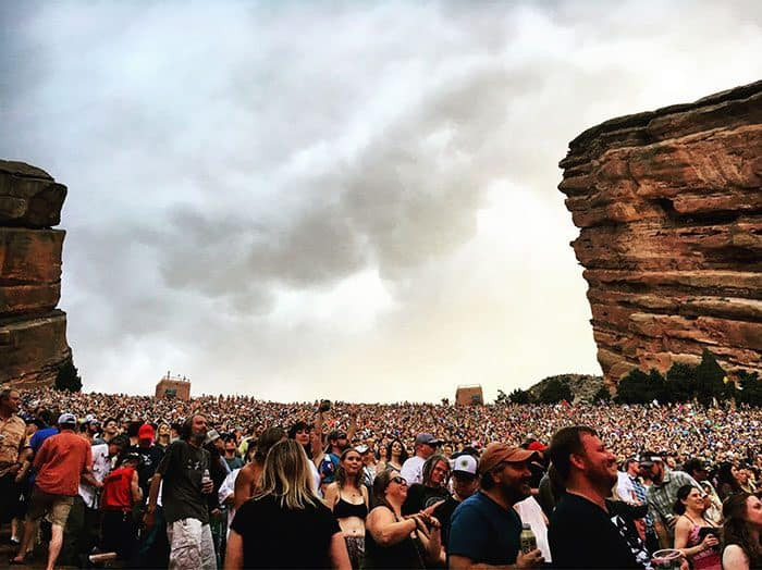 Fans enjoying a Red Rocks show from their seats