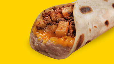 Loaded potato and chorizo pirata breakfast taco from Taco Palenque Round Rock, with potatoes, chorizo, cheese, and beans.