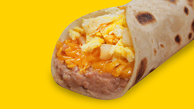 Hearty potato and egg pirata breakfast taco at Taco Palenque Round Rock, featuring potatoes, eggs, cheese, and beans.