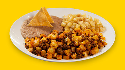 Hearty potato and chorizo breakfast plate at Taco Palenque Round Rock, with potatoes, chorizo, beans, and tortillas.