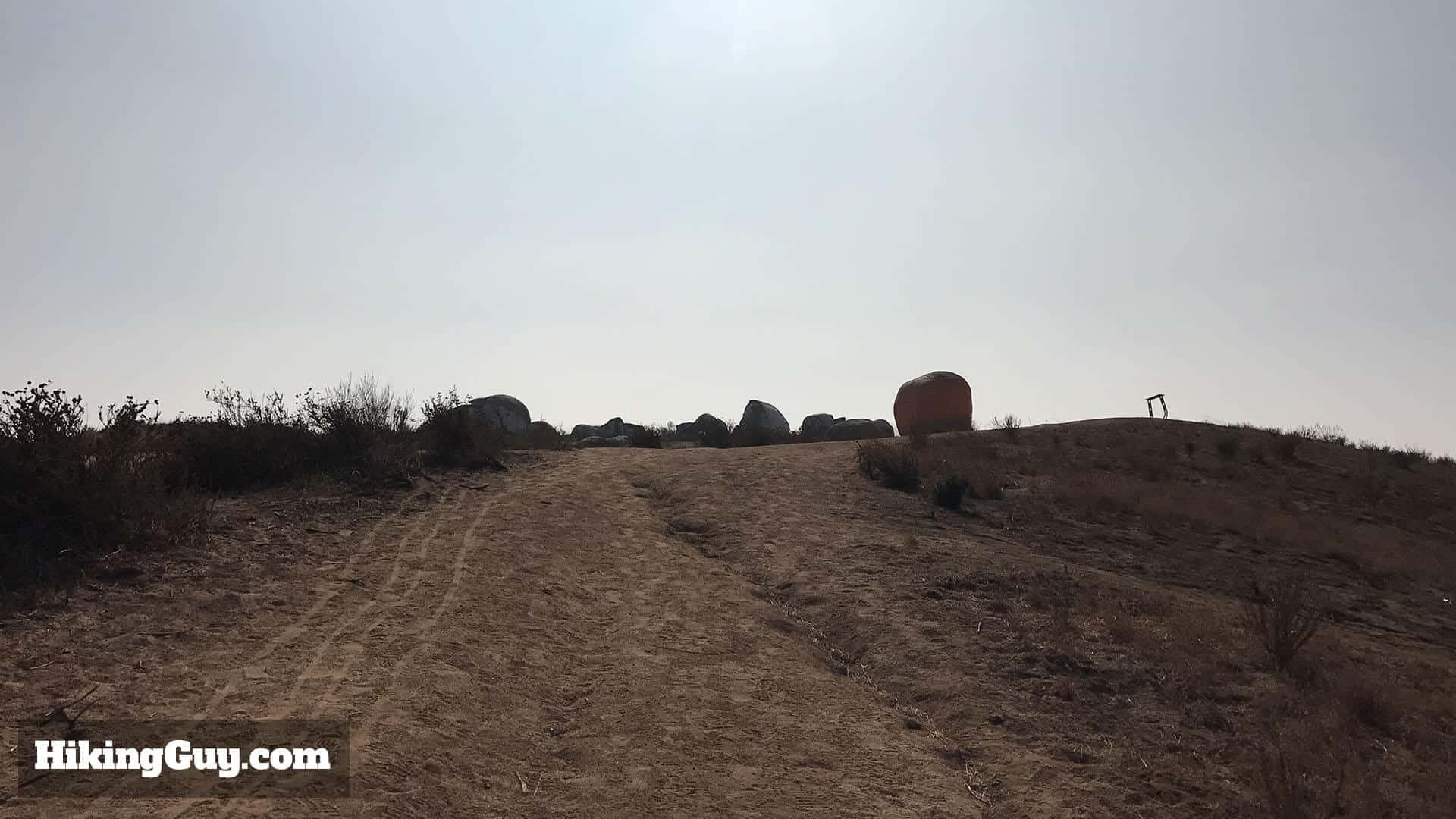 Pumpkin Rock Monument Norco California: Finally, reach the iconic Pumpkin Rock, a zipper-mouthed monument and photo opportunity in Norco, CA.