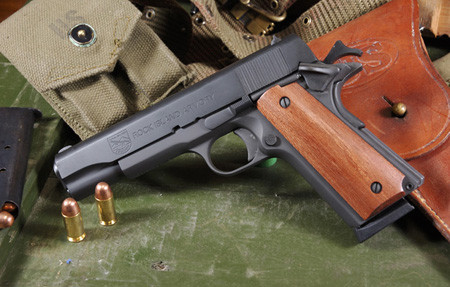 Rock Island Armory M1911A1 Field Strip: Components of the RIA 1911 laid out, highlighting its straightforward design