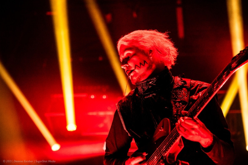 John 5 of Rob Zombie playing guitar at Blue Ridge Rock Festival Day 2. The guitarist is performing his signature style on stage with Rob Zombie.