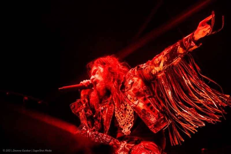 Rob Zombie performing on stage at Blue Ridge Rock Festival Day 2. Rob Zombie is in costume and performing energetically on stage.