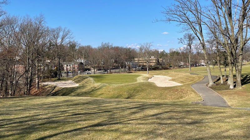 The beautifully contoured green at the par-3 16th hole of Montclair Golf Club at Rock Spring, a testament to classic golf architecture.