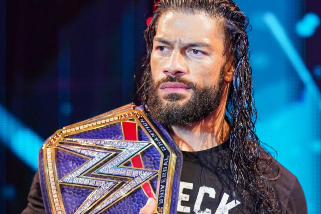 Roman Reigns headshot in wrestling ring intense gaze