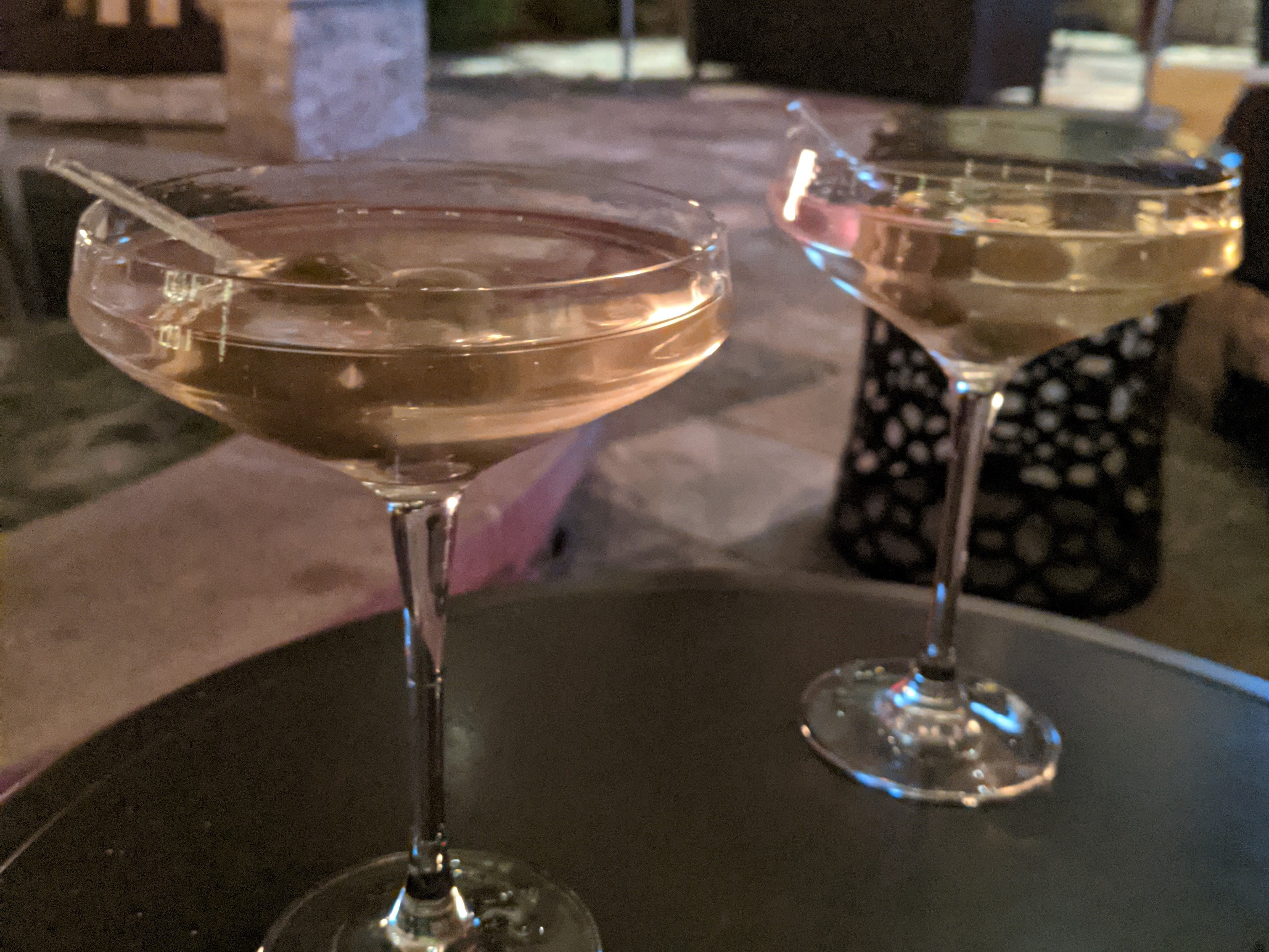 Two martinis served at an outdoor bar