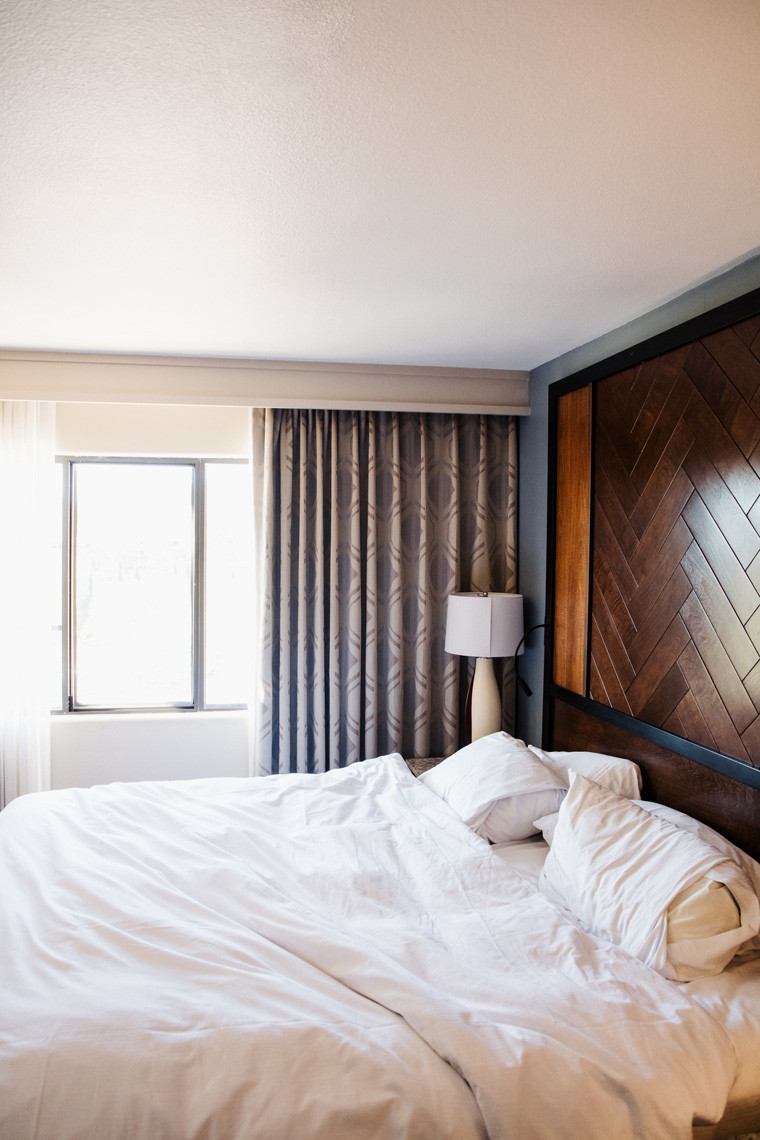 Comfortable king bed in a suite at Hilton Sedona Resort at Bell Rock, inviting relaxation after a day of exploring