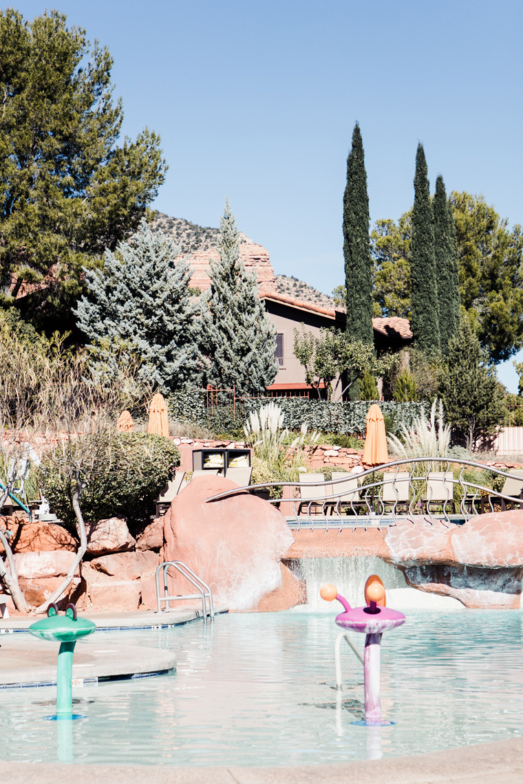 Families enjoying the pool area at Hilton Sedona Resort at Bell Rock, highlighting the resort's family-friendly atmosphere