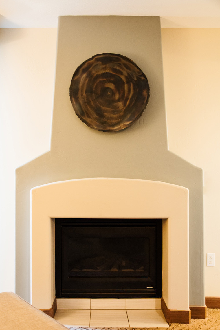 Fireplace in the living room of a suite at Hilton Sedona Resort at Bell Rock, adding a touch of warmth and ambiance