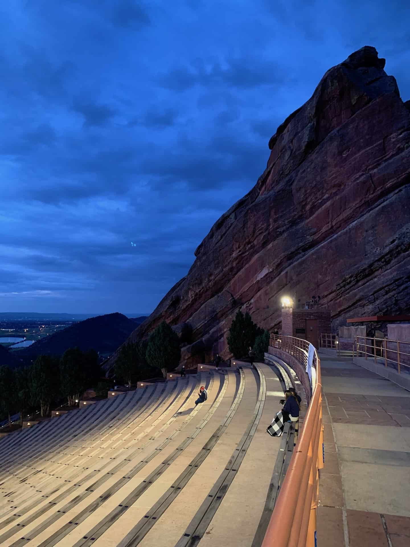 Creation Rock and Ship Rock formations within the Red Rocks Amphitheatre at sunrise in Denver