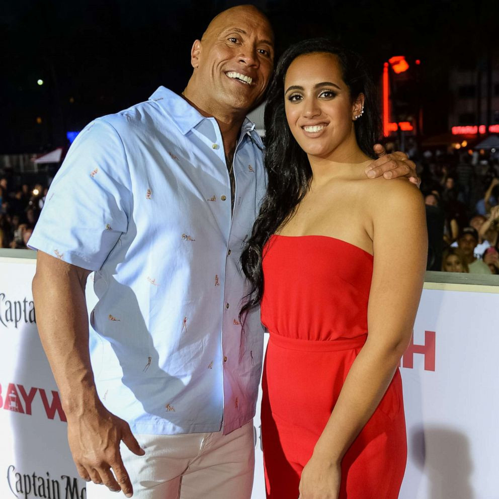 Simone Johnson, The Rock's daughter, with her father Dwayne Johnson. Simone is now known as Ava Raine in WWE, marking the start of her professional wrestling career.