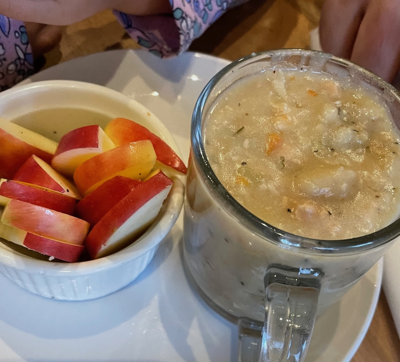 Child eating chicken and dumplings at Speckled Trout