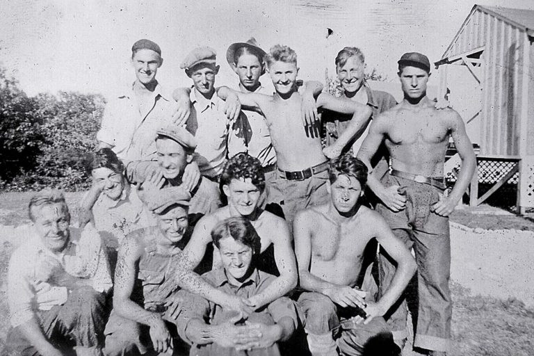 Group portrait of CCC Camp 1609 workers circa 1934 at Starved Rock Lodge, capturing a moment in history.