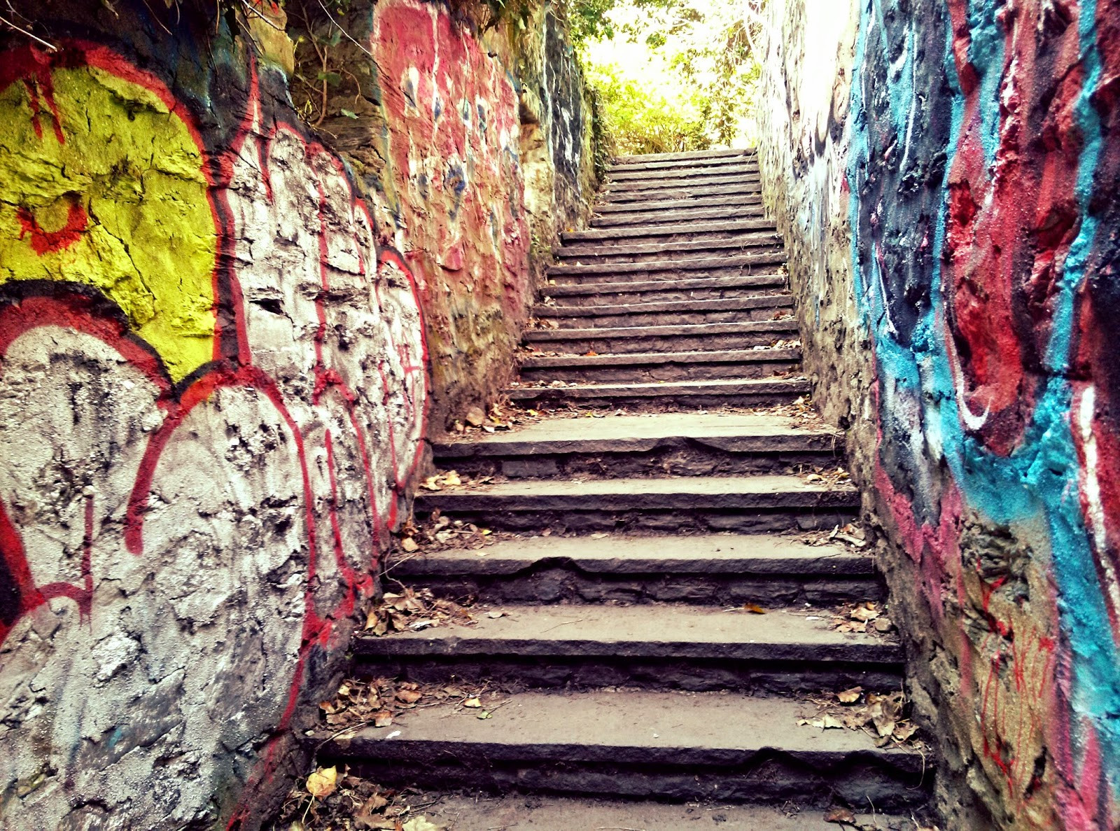 Stone steps leading through the Glendinning Rock Garden in Fairmount Park, Philadelphia, highlighting pedestrian access in the park's revitalization plan.