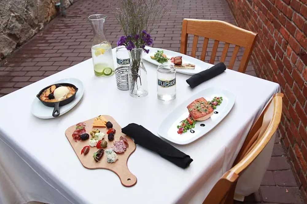 Patrons enjoying a meal at Flipside Restaurant, a popular dining destination in Rock Hill