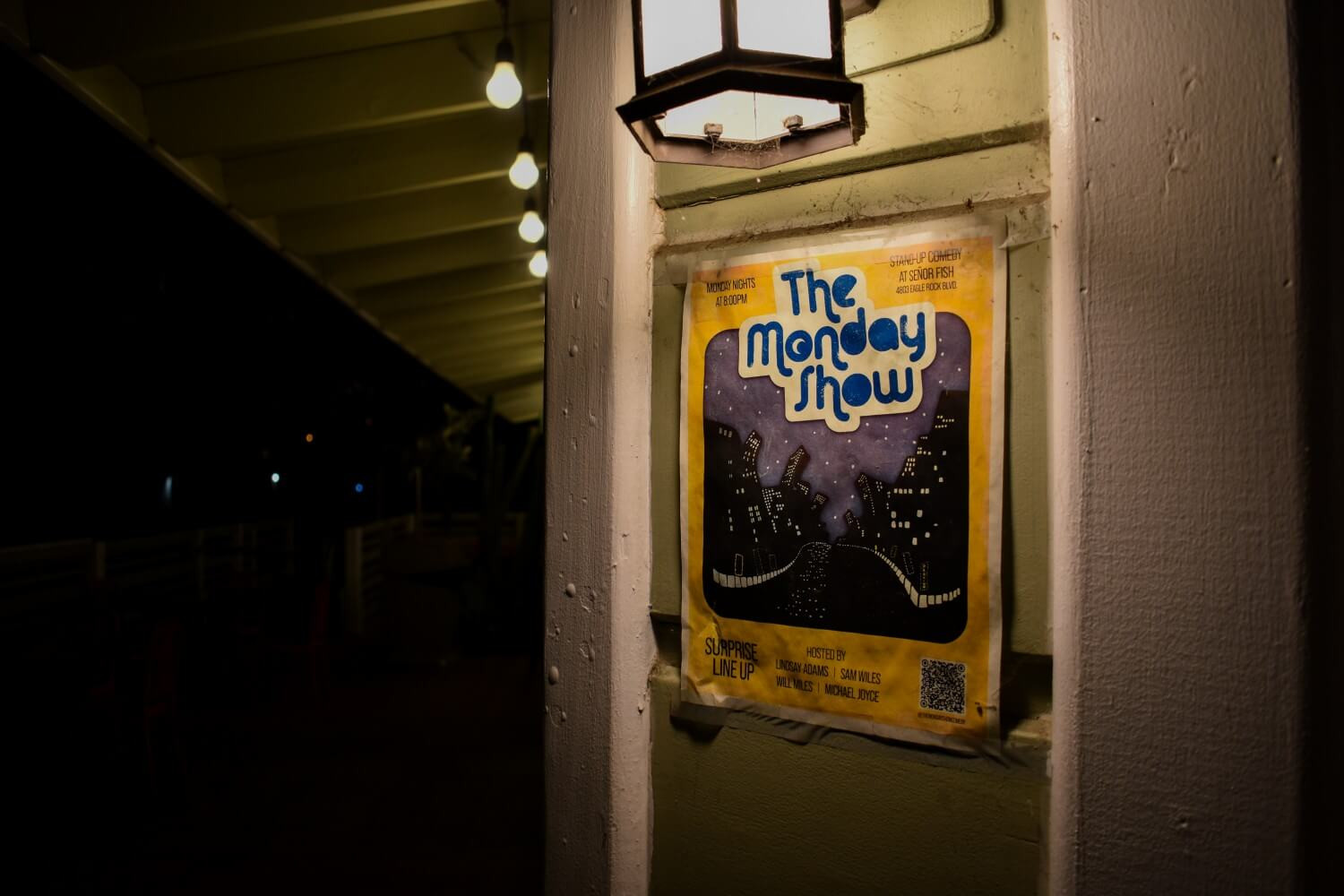 Poster advertising &quot;The Monday Show&quot; stand-up comedy event displayed outside Señor Fish in Eagle Rock, California.