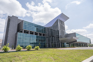 Exterior view of the UAMS Orthopaedic &amp; Spine Hospital in Little Rock, Arkansas, showcasing its modern architecture and accessibility.