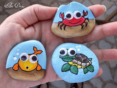 Advanced painted rocks ideas: mandala patterns and under the sea creatures.