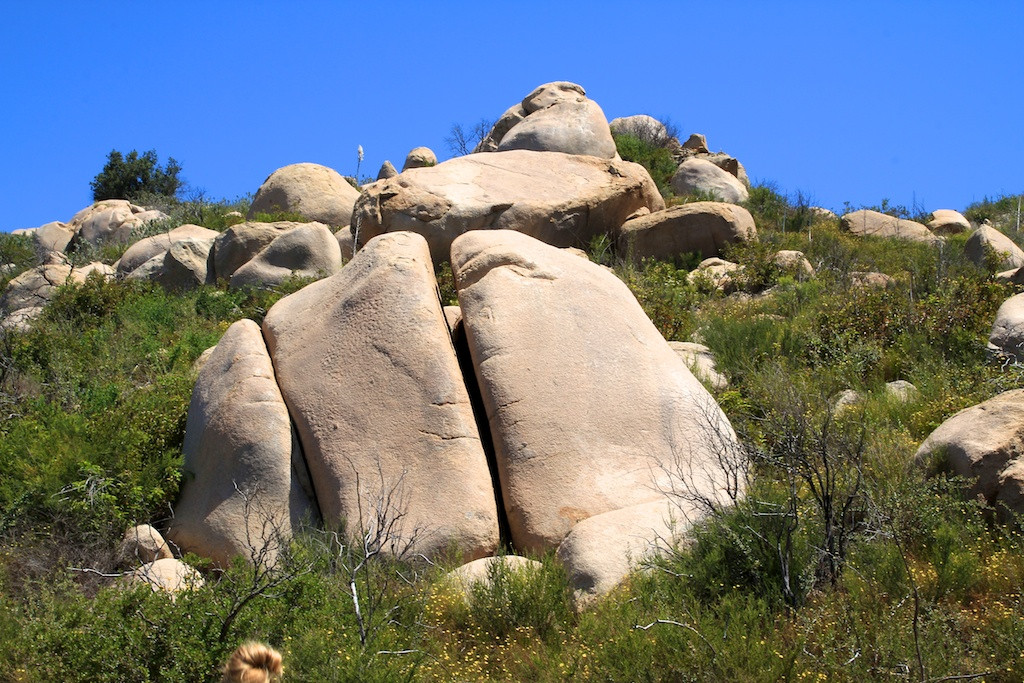 Intriguing rock formation along the Potato Chip Rock trail, showcasing the geological diversity and unique rock features of the hike.