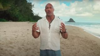 Dwayne Johnson announcing live-action Moana movie on a beach