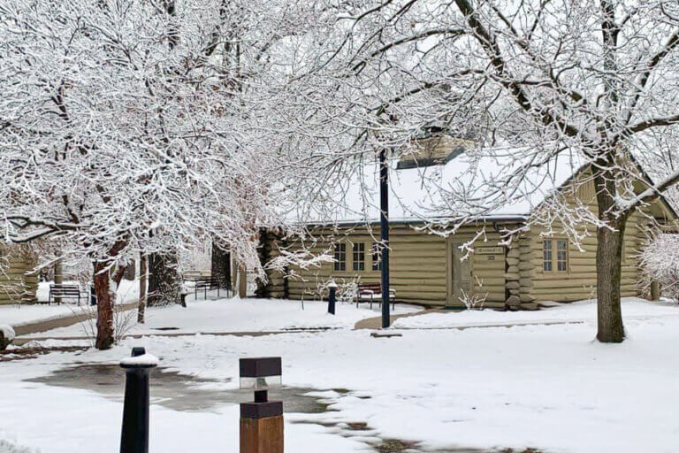 Winter cabin scene in the snow at Starved Rock Lodge