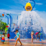 Children enjoying water features at White Rock Splash Park, a family-friendly destination in Northern California.