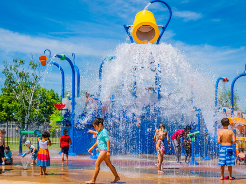 Children enjoying water features at White Rock Splash Park, a family-friendly destination in Northern California.