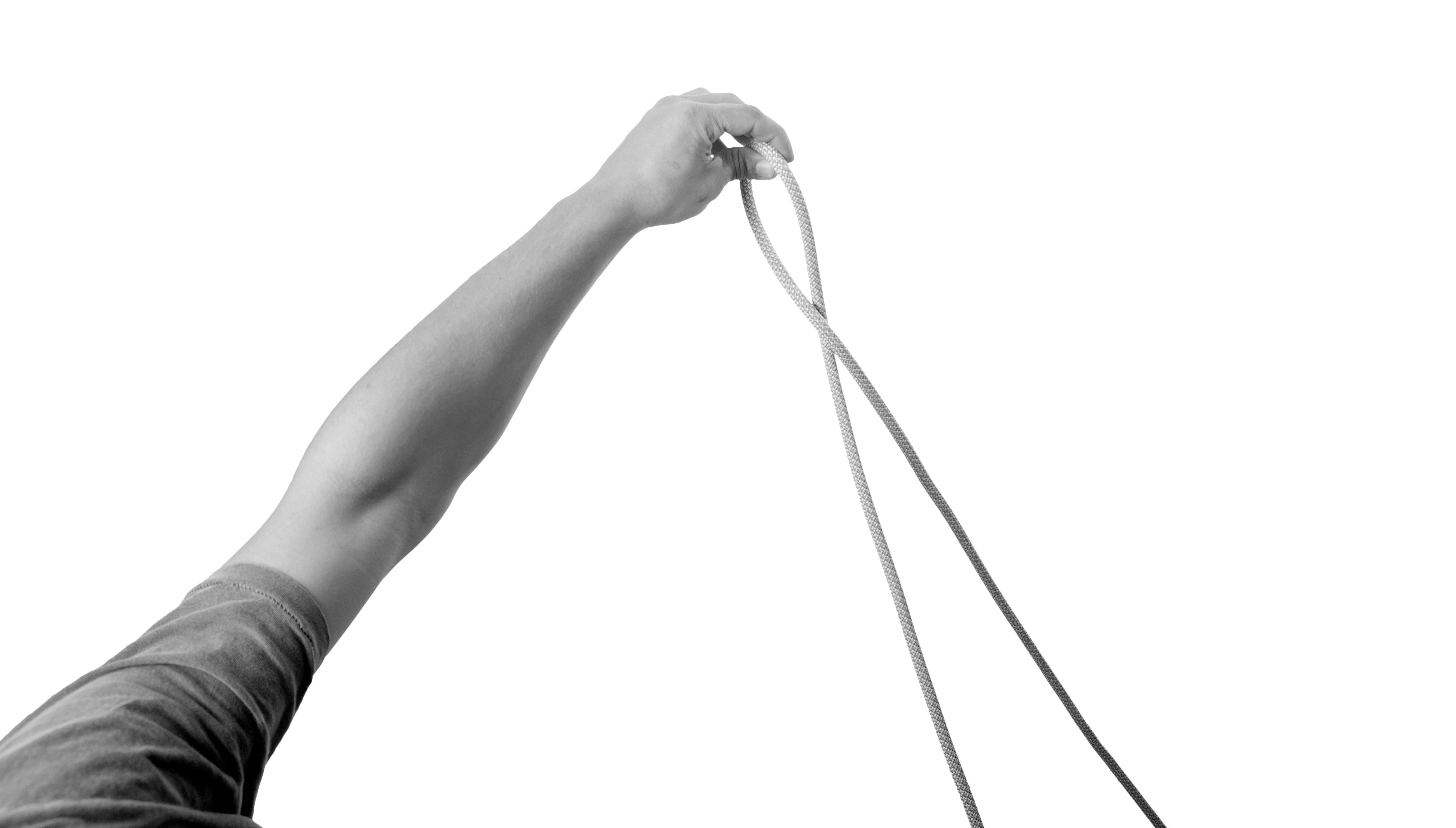 Making a bight in the rope to start the figure eight knot.