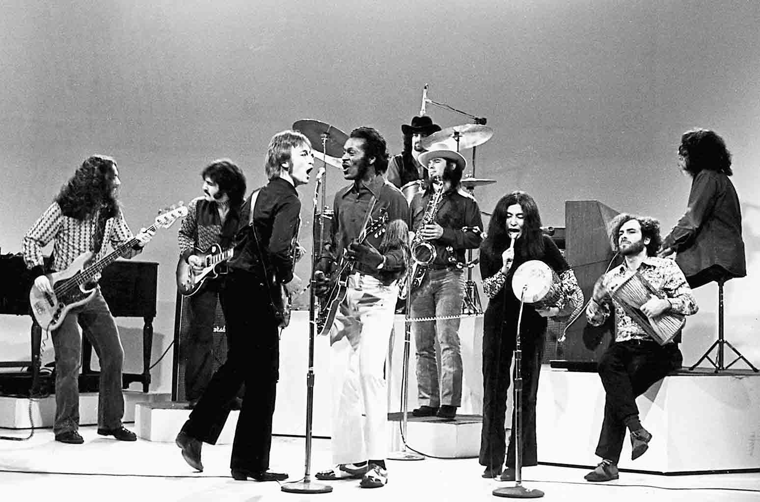 Rock band performing on stage, showcasing the diverse and evolving nature of rock music
