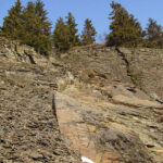 Slaty cleavage gives slate a distinct layered appearance.