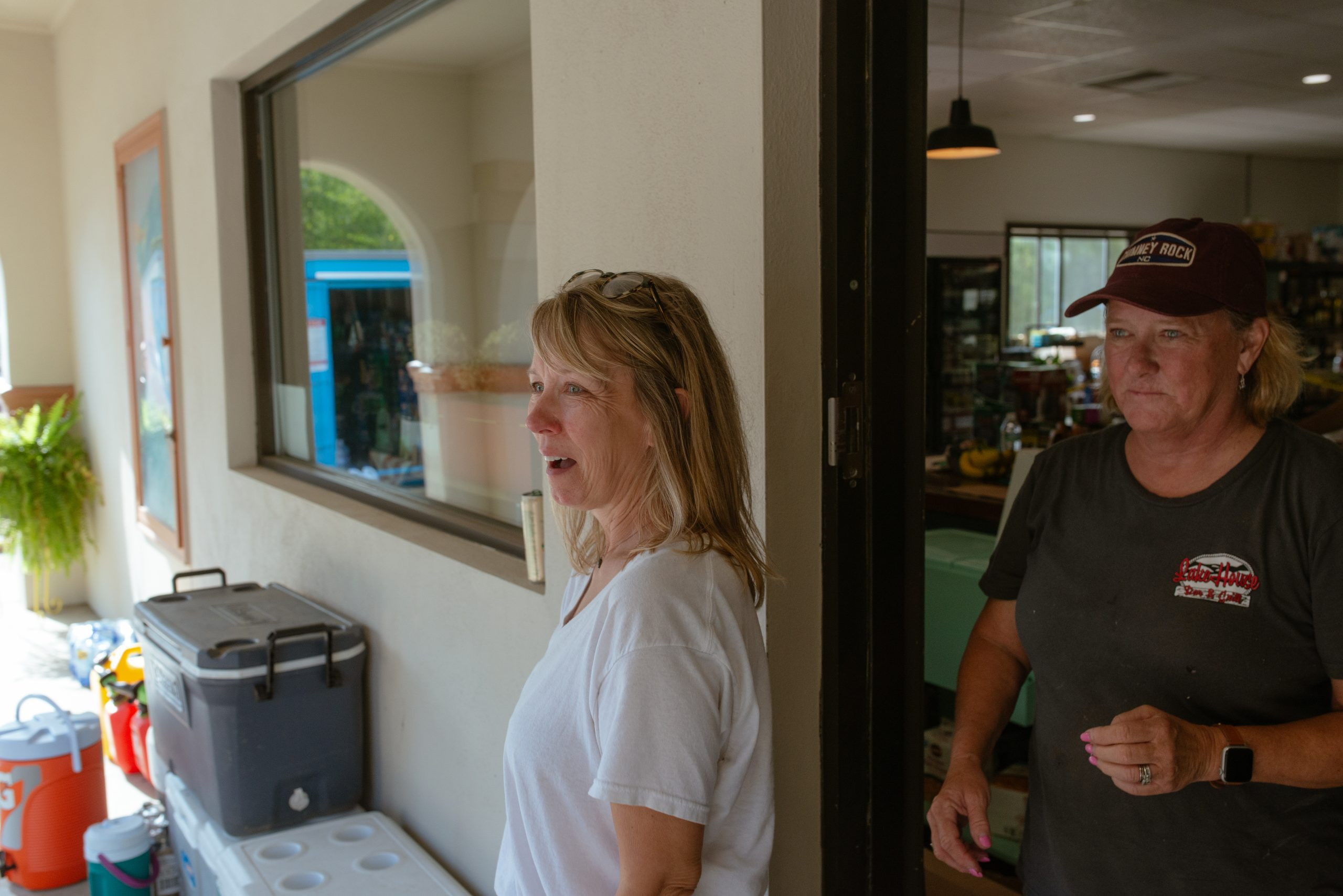 woman walking out of restaurant
